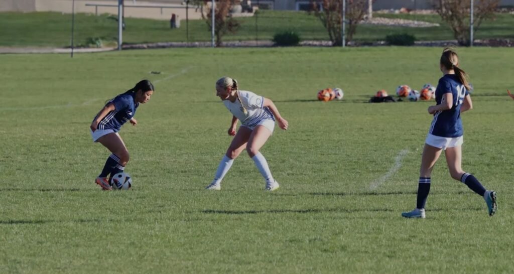 Girls playing soccer